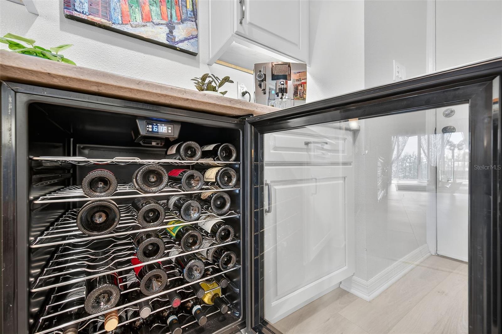 Wine fridge, fully stocked