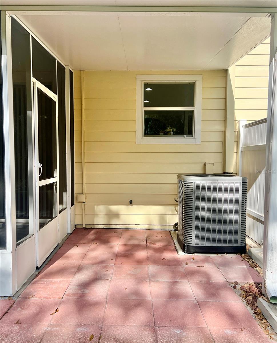 The AC Condenser unit is under cover which helps prolong its life expectancy.