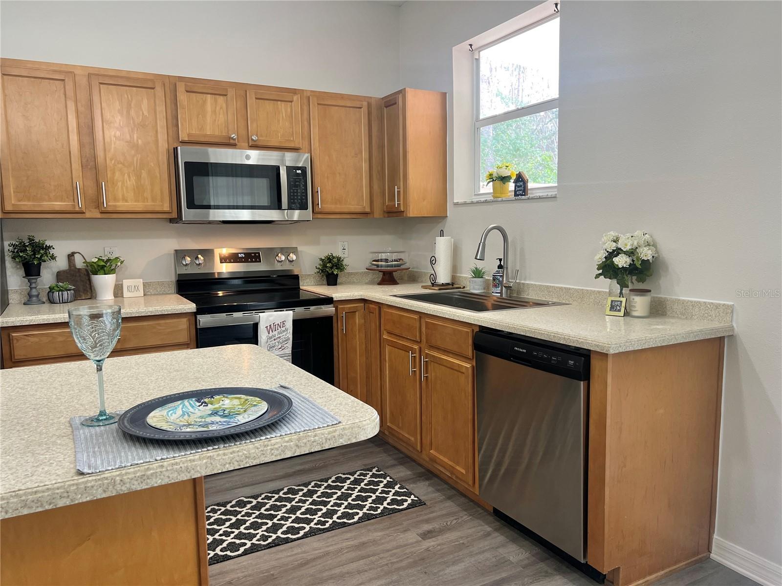 A lot of cabinet storage and counter space....PLUS brand new stainless steel appliances....and NEW cabinet hardware!