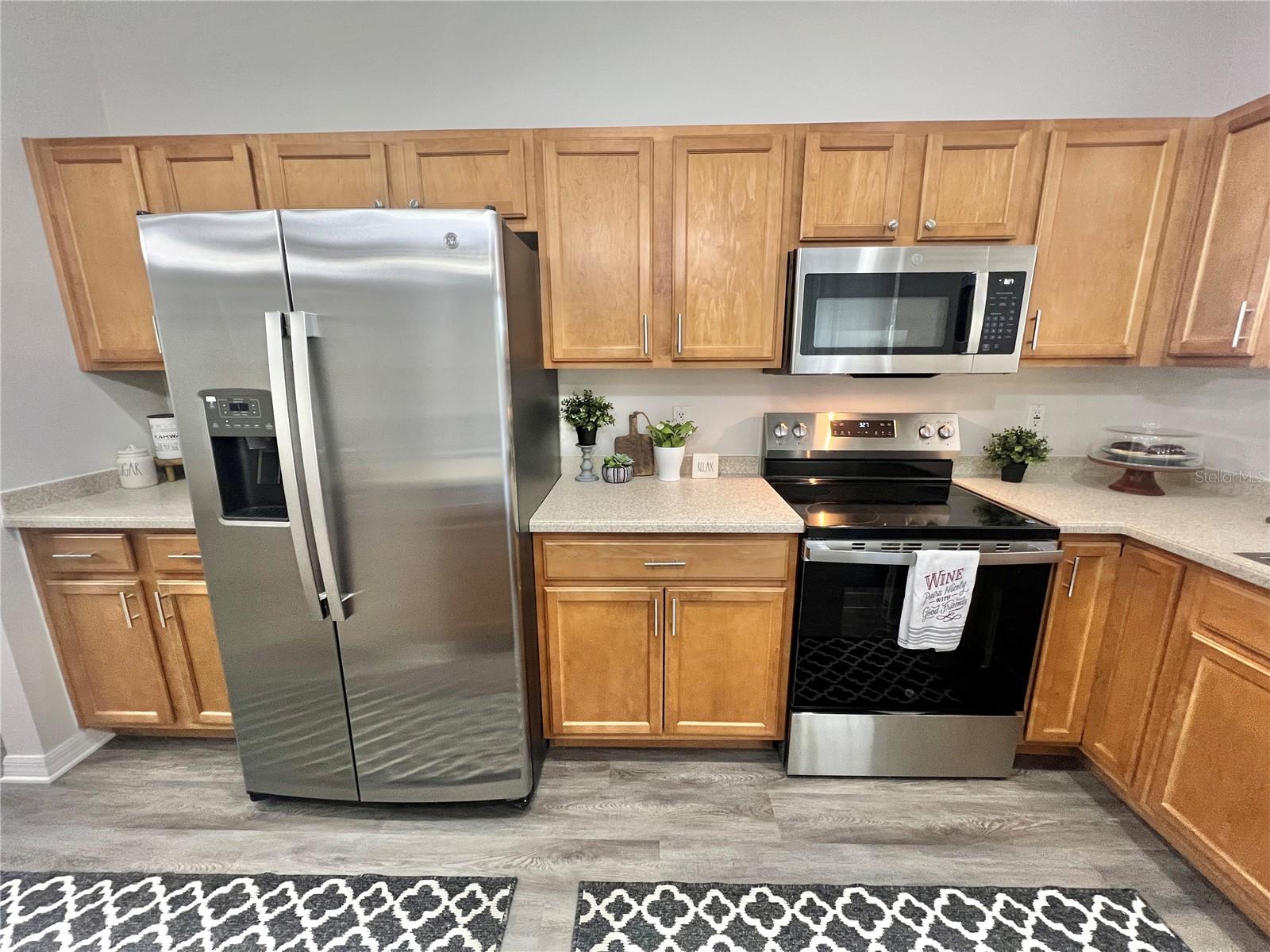 A lot of cabinet storage and counter space....PLUS brand new stainless steel appliances....and NEW cabinet hardware!