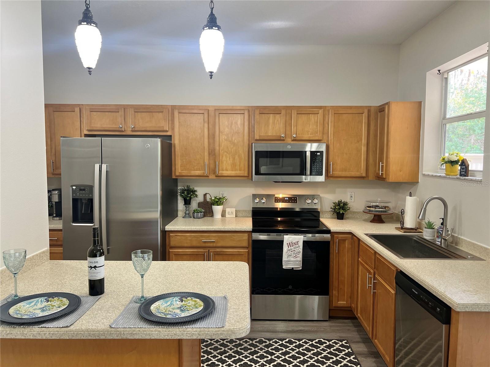 A lot of cabinet storage and counter space....PLUS brand new stainless steel appliances....and NEW cabinet hardware!