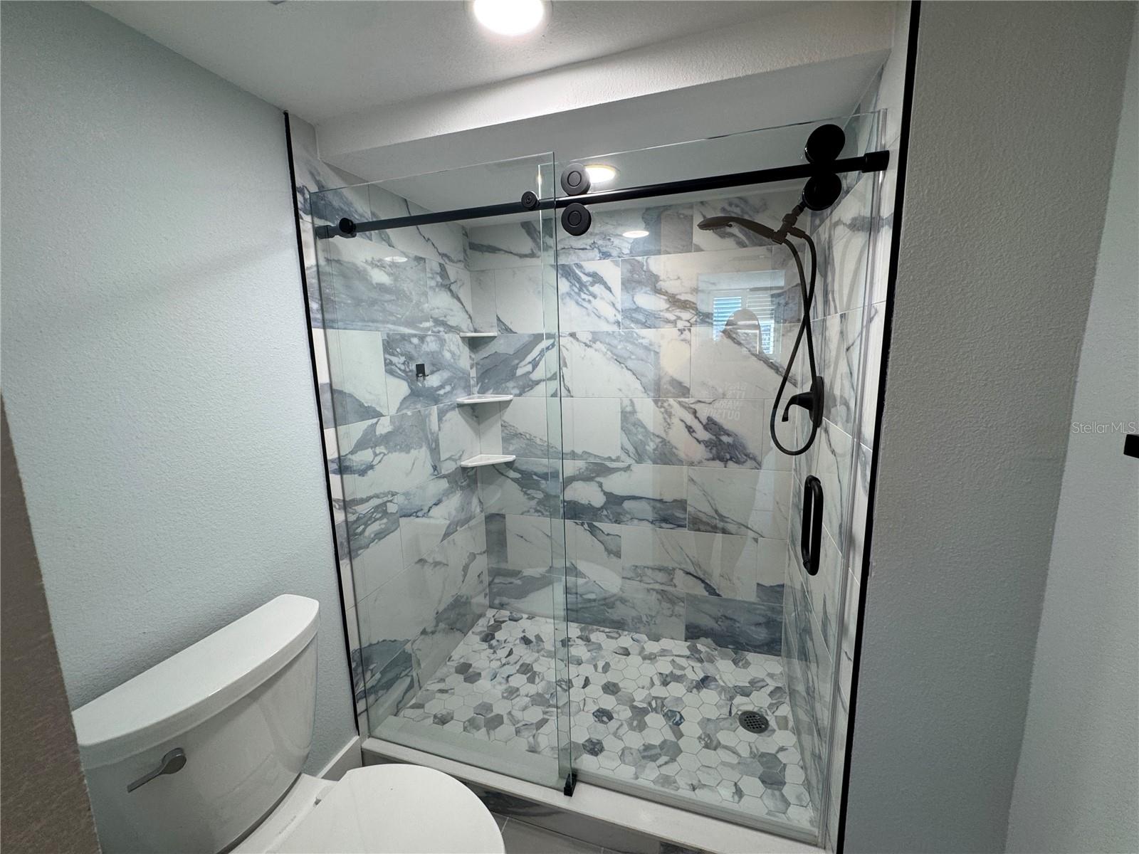 UPGRADED PRIMARY SHOWER