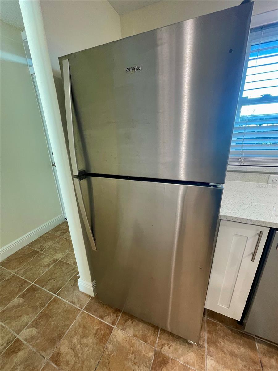 brand new stainless fridge