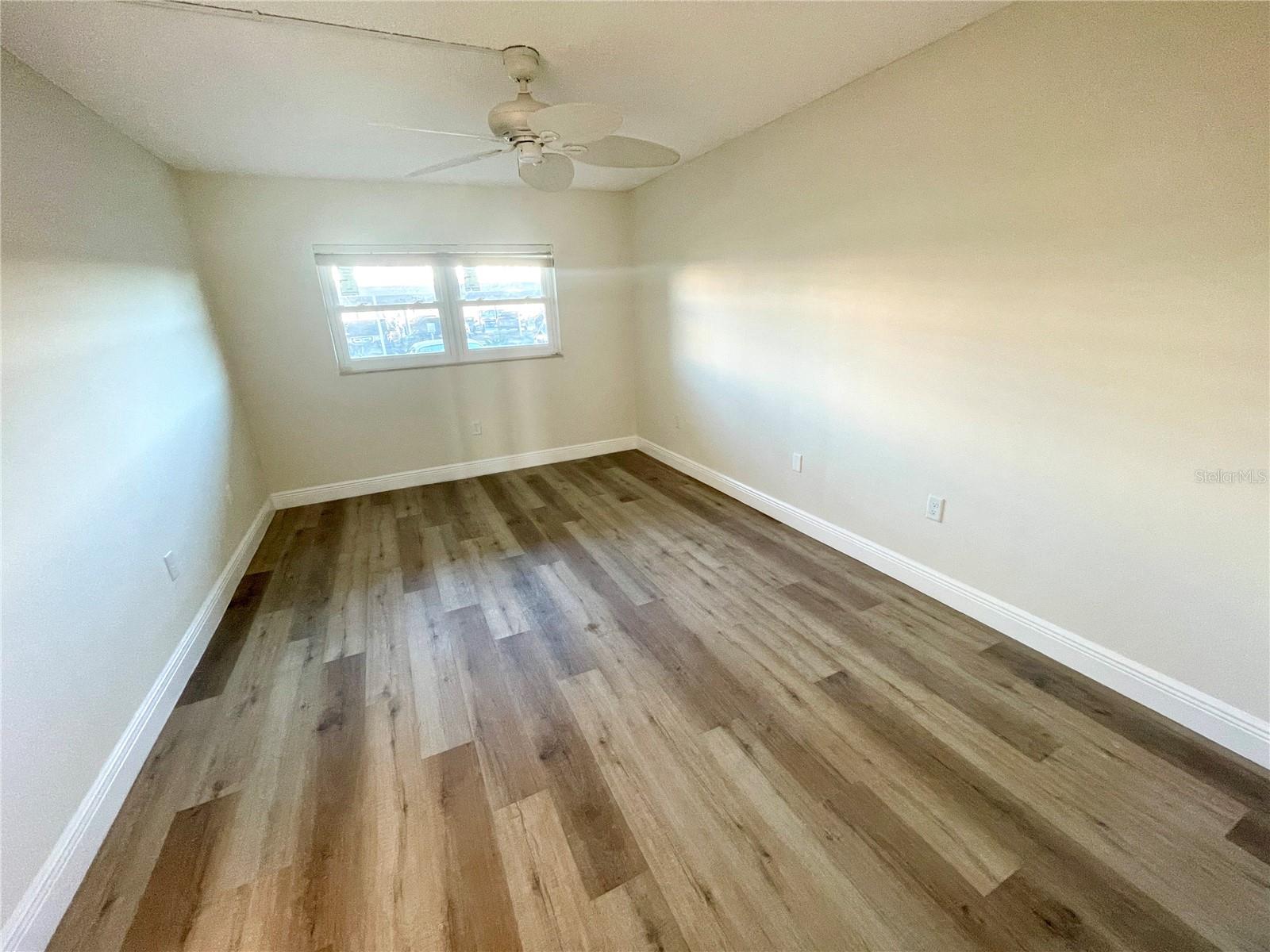 Beautiful new plank flooring, new drywall, molding and new paint and brand new windows!