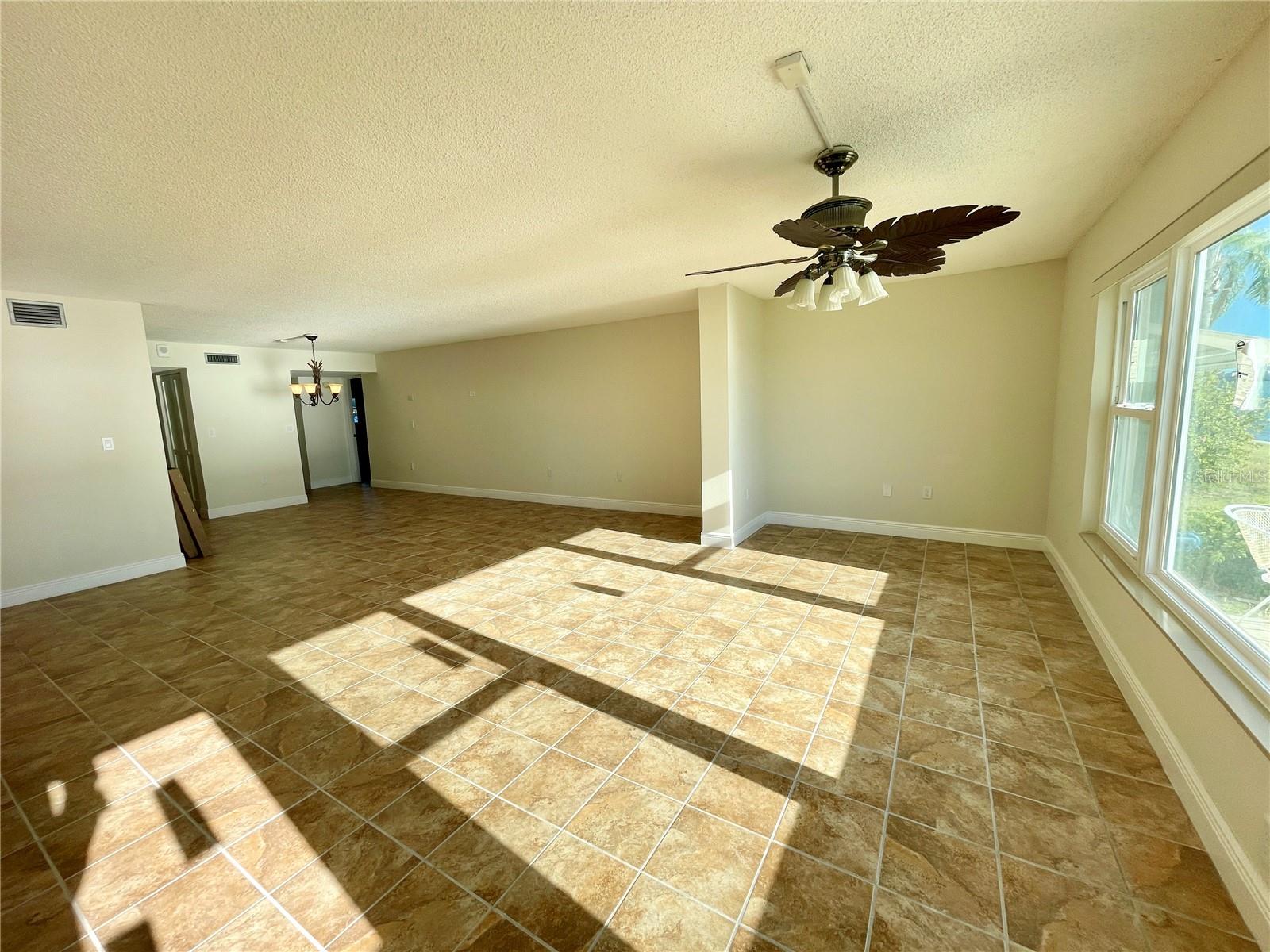 Let the sunshine in! Glorious sun filled living area is superb