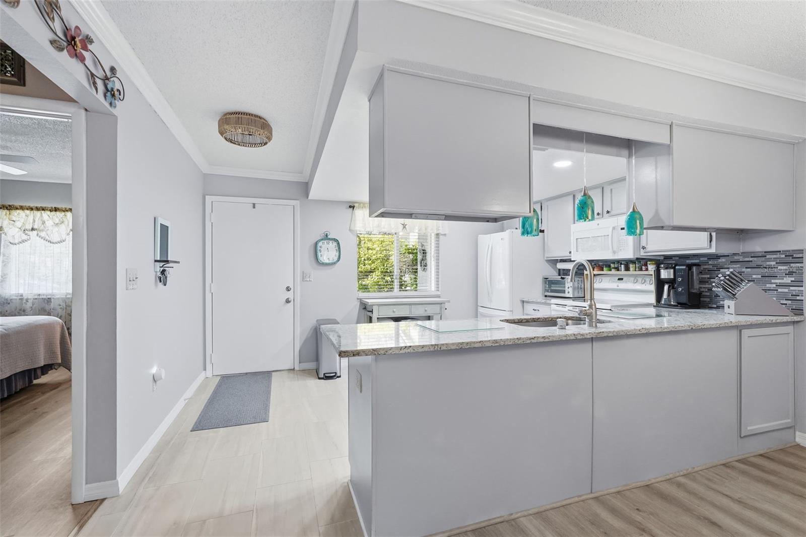 Front entryway to Kitchen