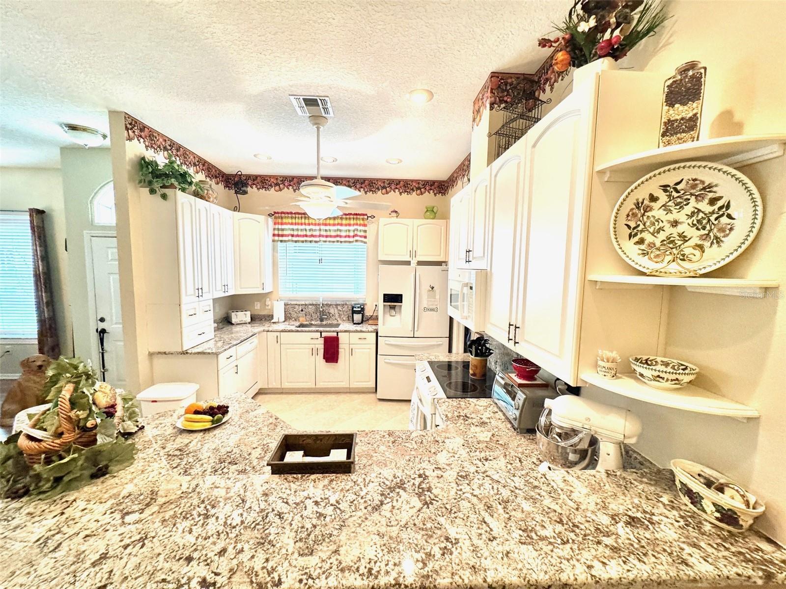 Kitchen has lots of granite