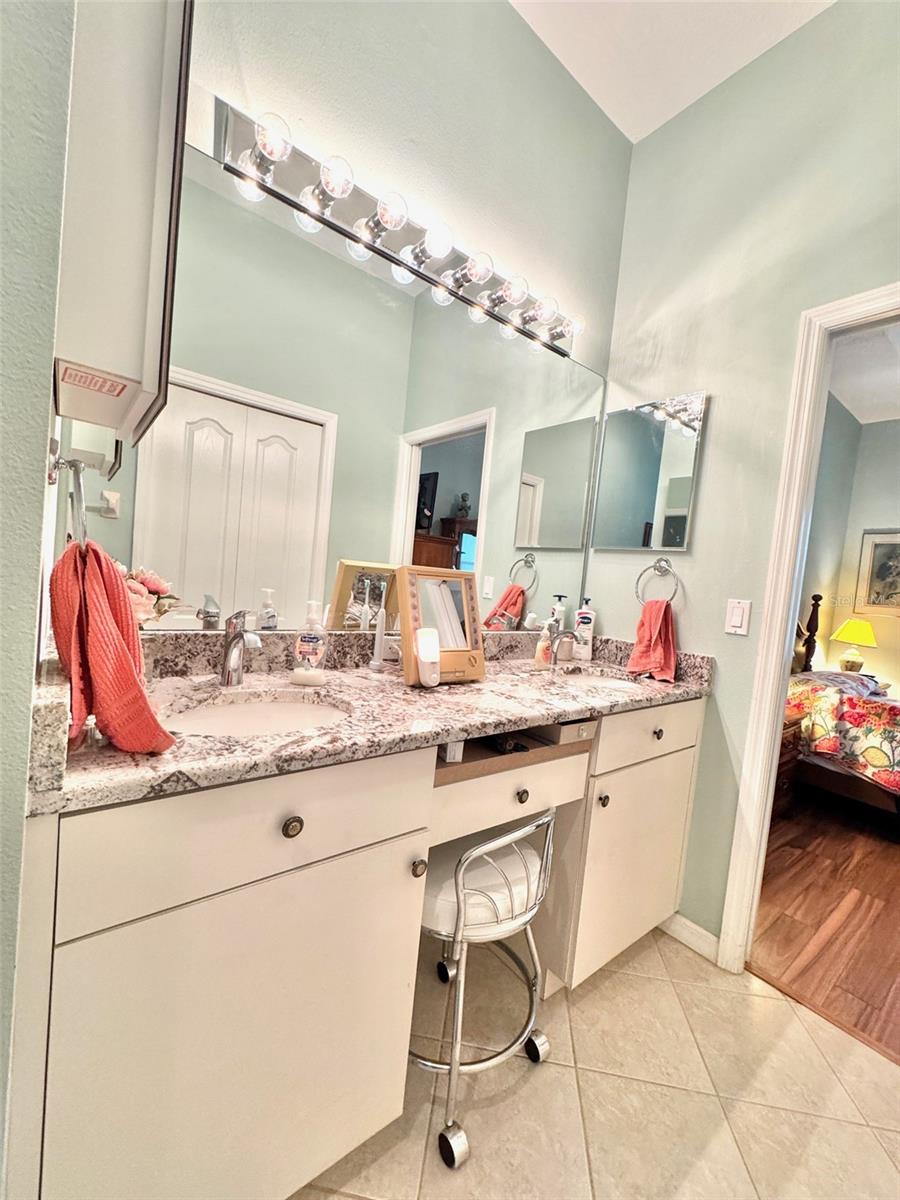 Ensuite bathroom with granite counters