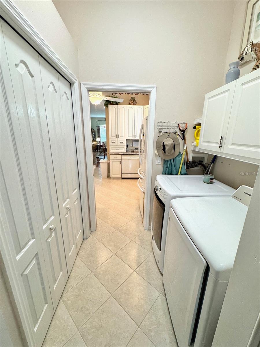 Large pantry in laundry room.