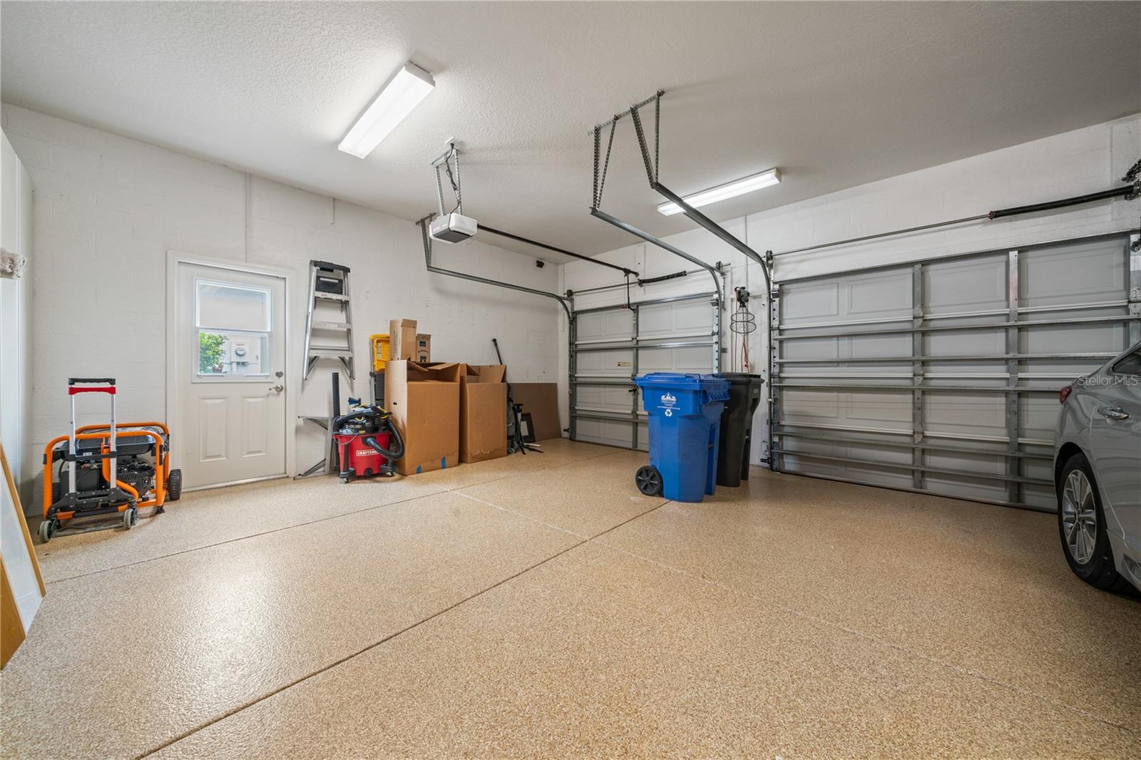 3 car garage with exterior access door