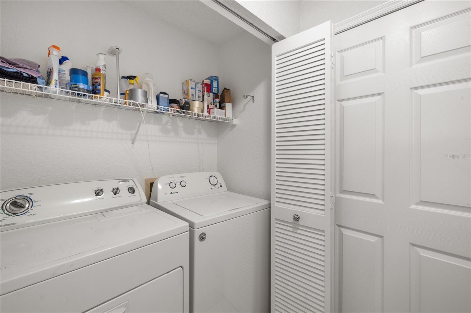 Inside laundry closet! Washer and dryer stay!