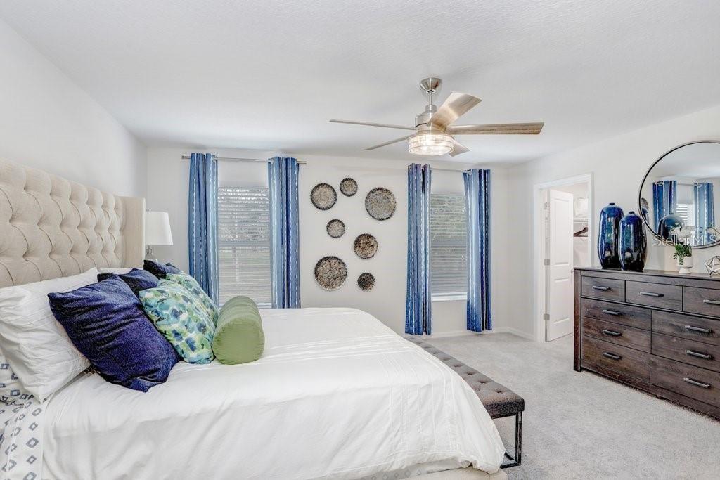 Primary Bedroom (photo of model home)