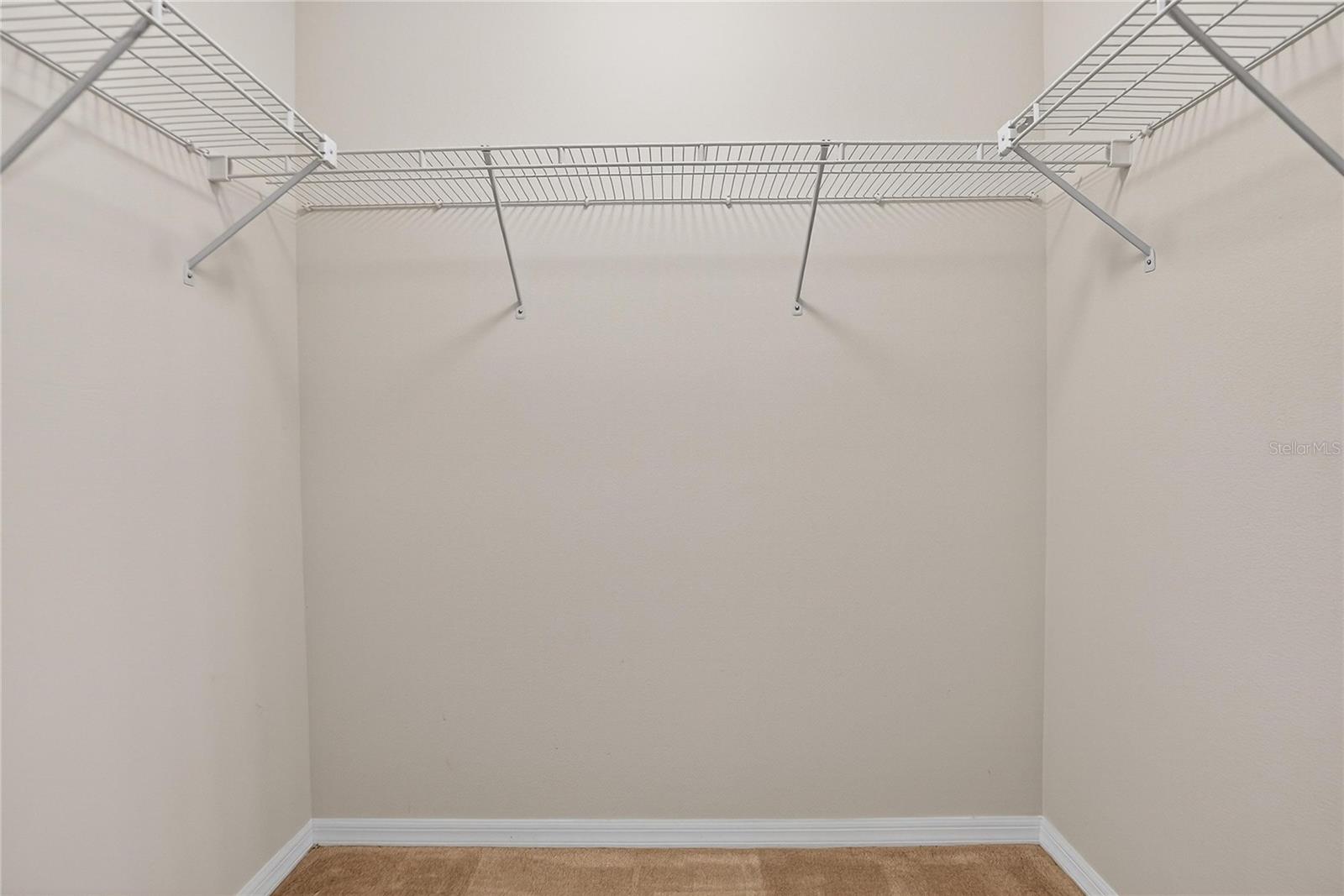 Primary Bedroom walk in closet