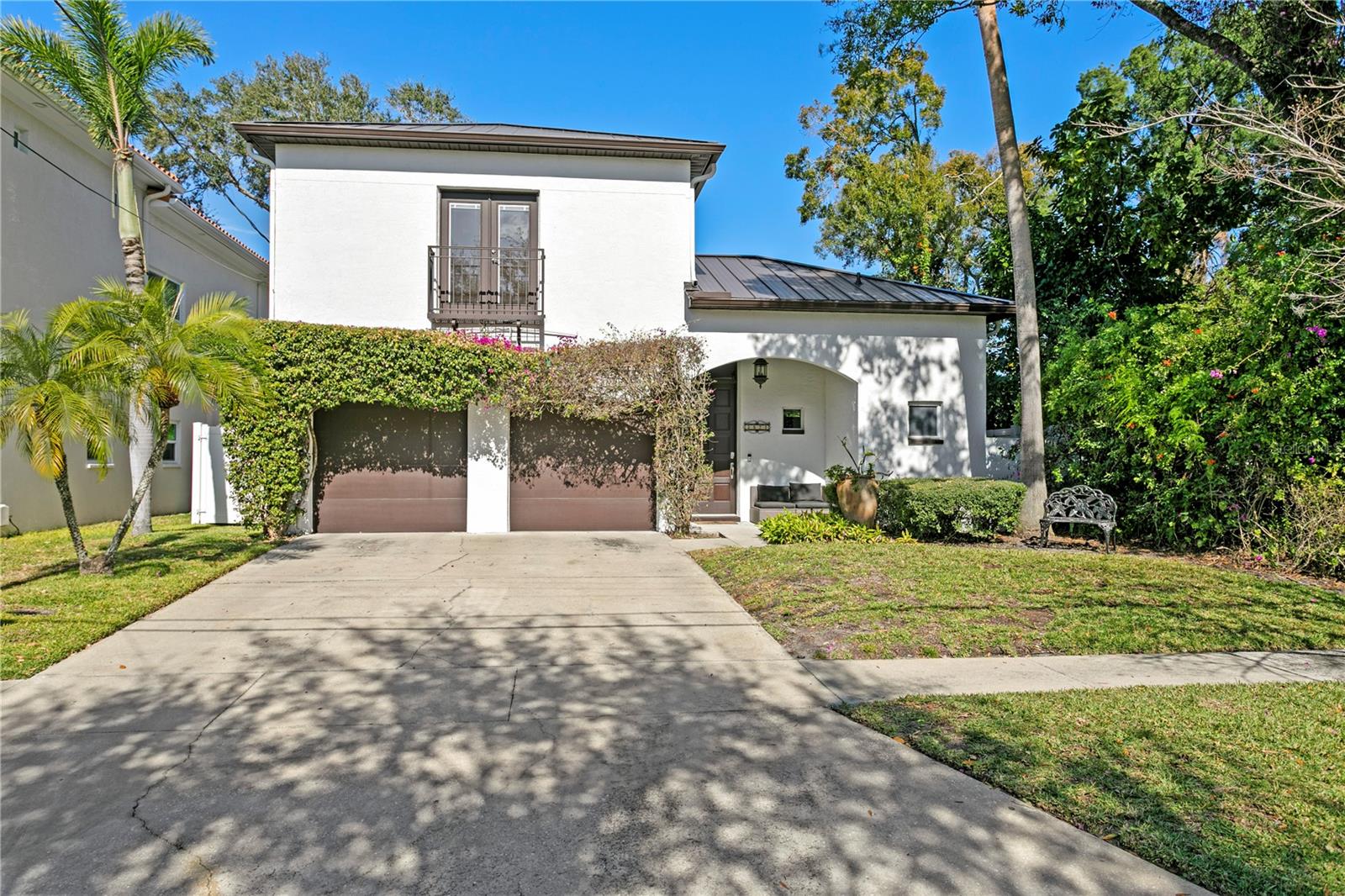 Crafted with full two-story concrete block construction and topped with a sleek, storm-resistant metal roof (2024), this home promises durability, low maintenance, and potential insurance benefits.