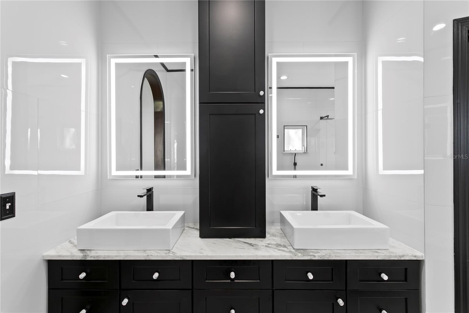 The primary bath is beautifully updated.