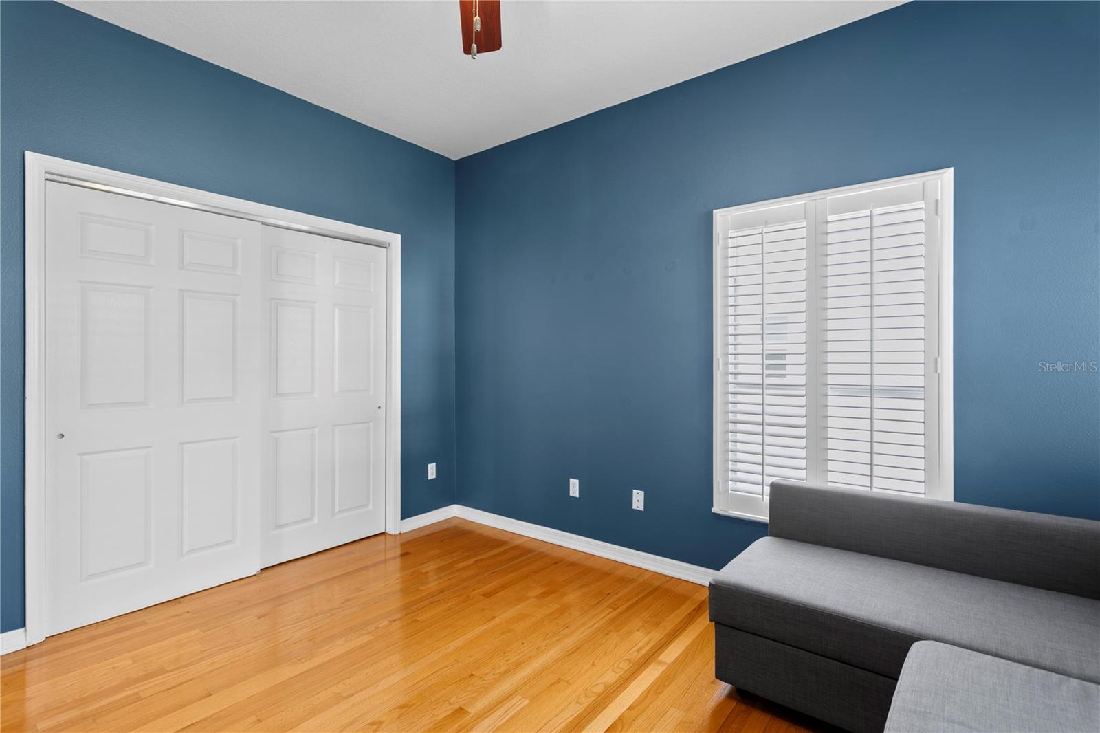 This spacious bedroom has generous closet space.