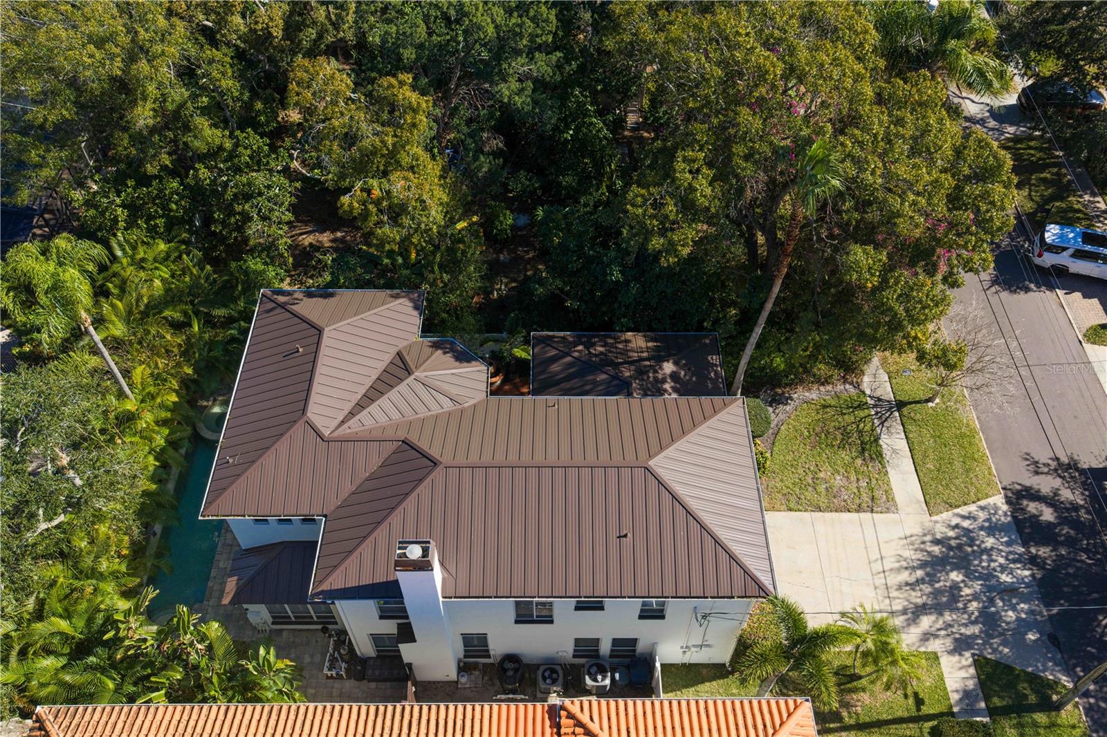 The sleek metal roof promises durability, low maintenance, and potential insurance benefits.