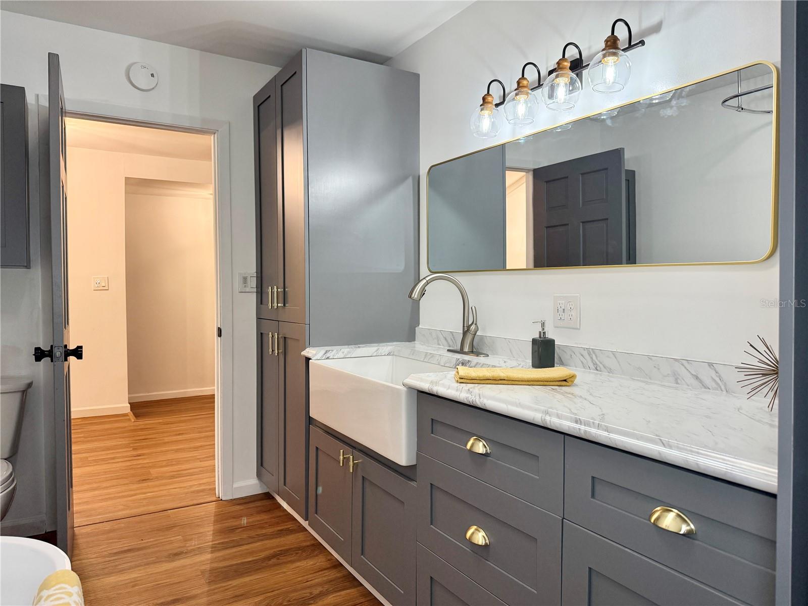 Guest Bath - Tons of Storage Space and a Farmhouse Sink
