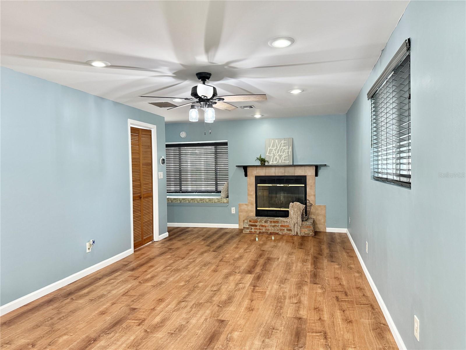 Primary Bedroom - Updated Lighting and Luxury Vinyl Floors