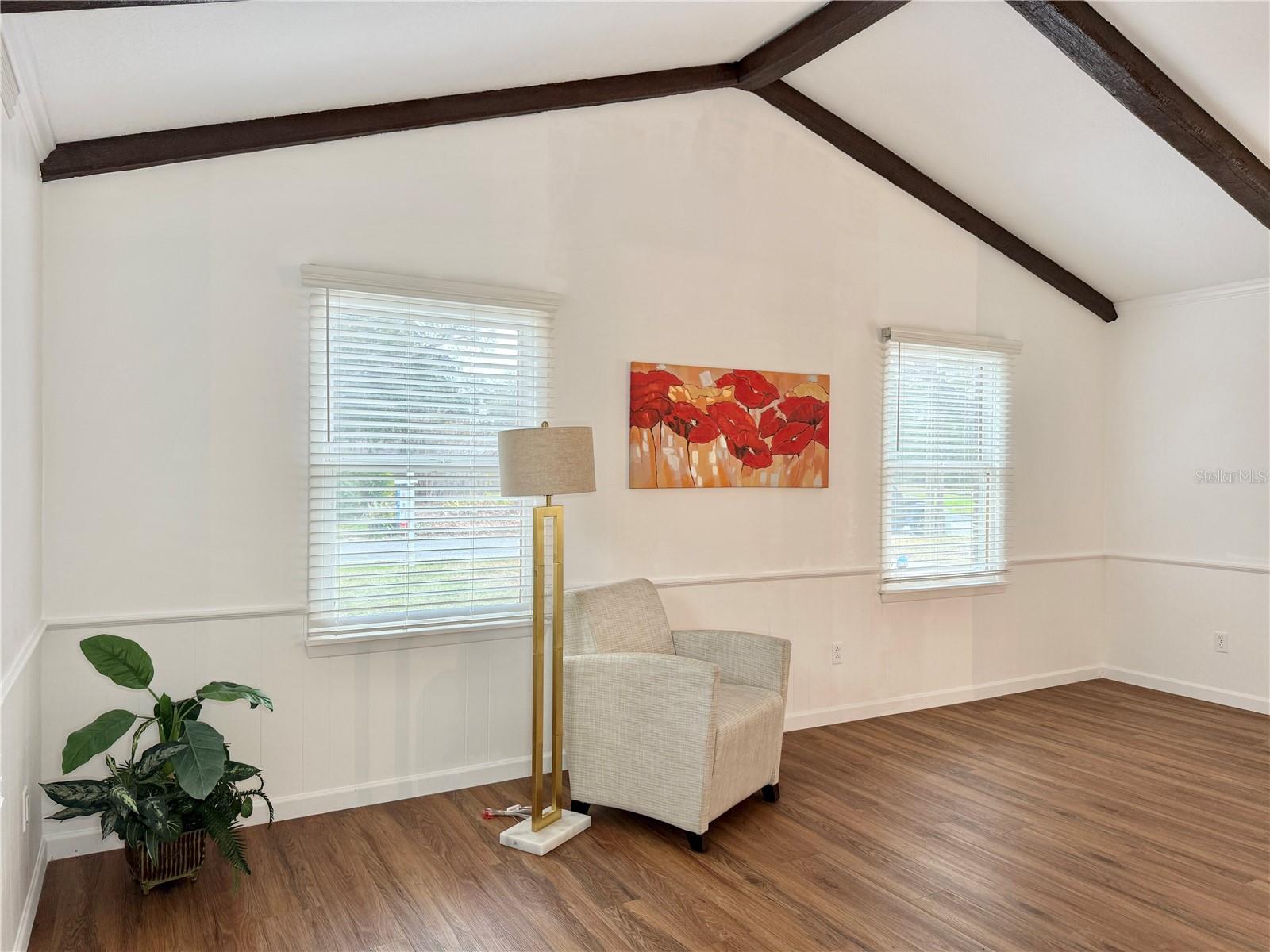 Living Room - Vaulted Ceiling and Decorative Wood Beams