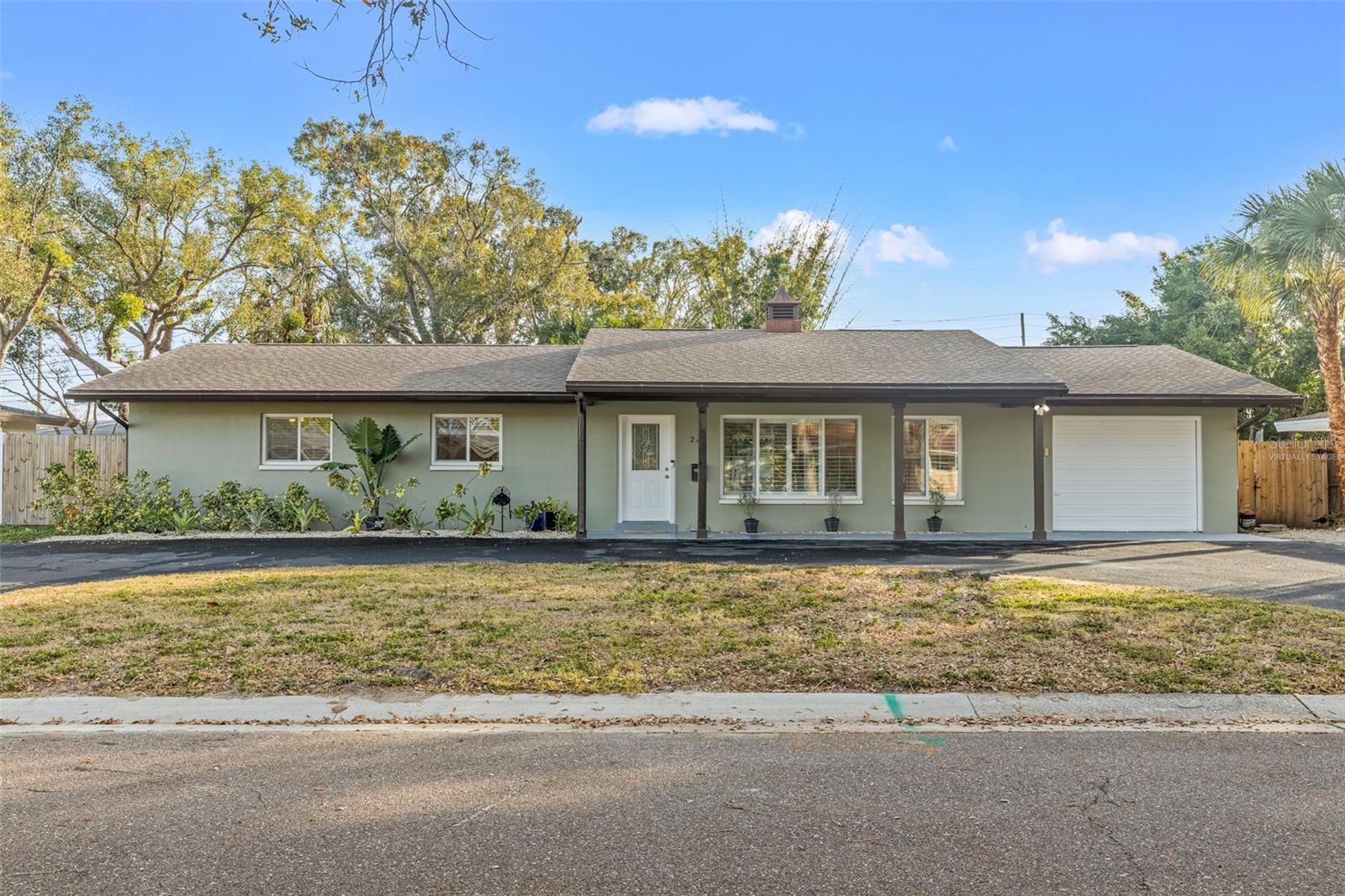 A portion of the grass in this photo was virtually staged until the sod is replaced