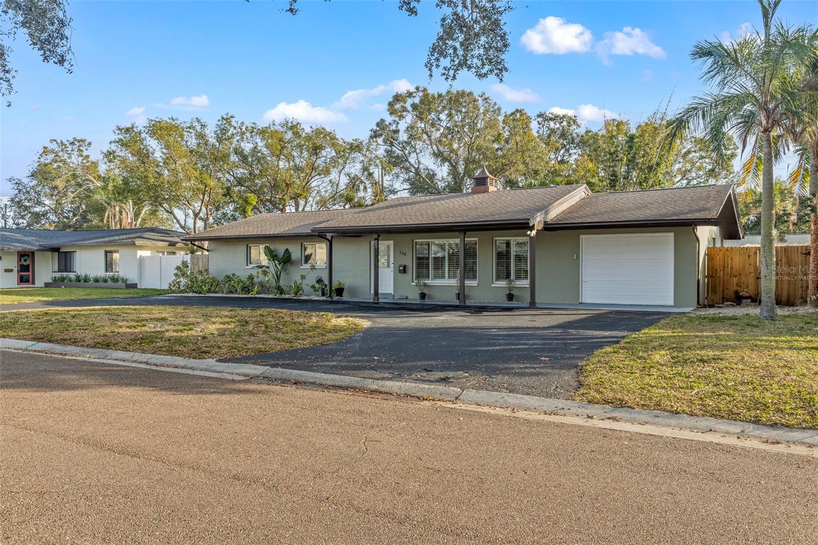 A portion of the grass in this photo was virtually staged until the sod is replaced