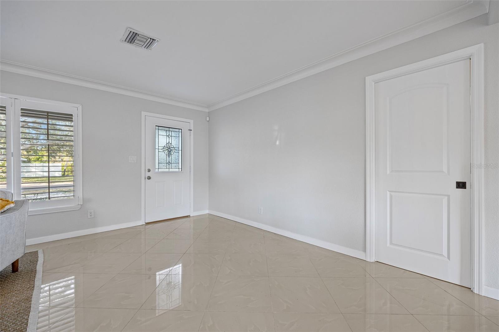 View of front door from Dining area