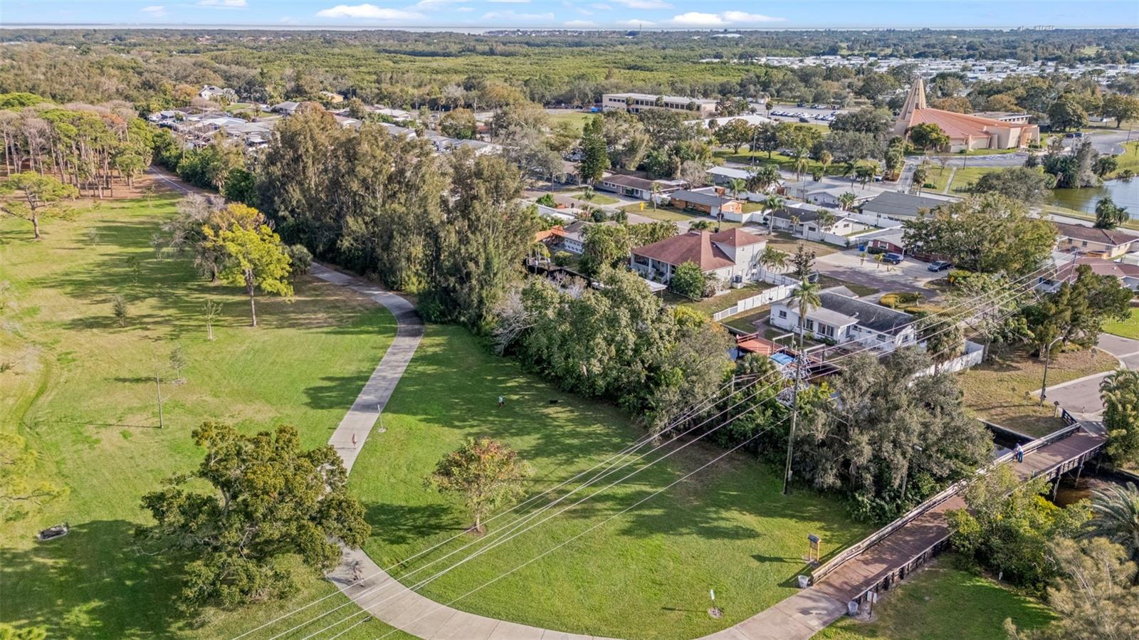 view of biking trail and park
