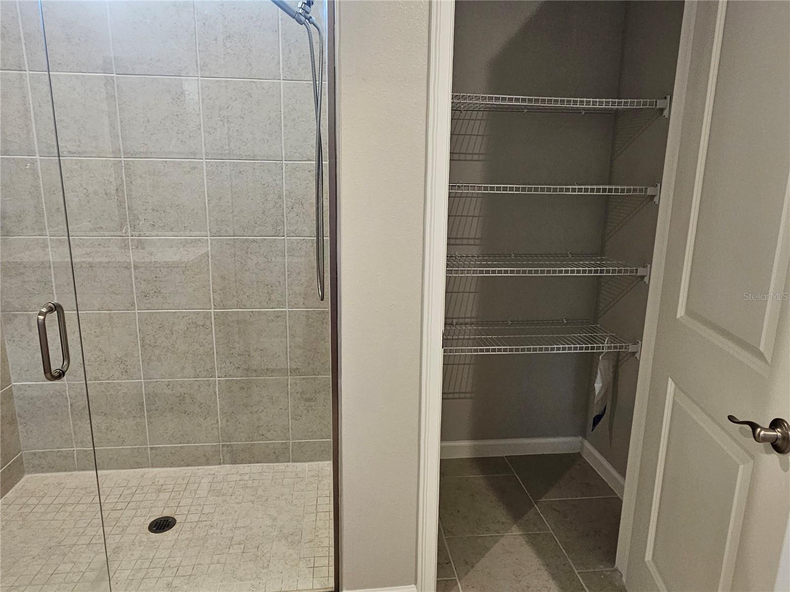 Linen closet in Primary bathroom