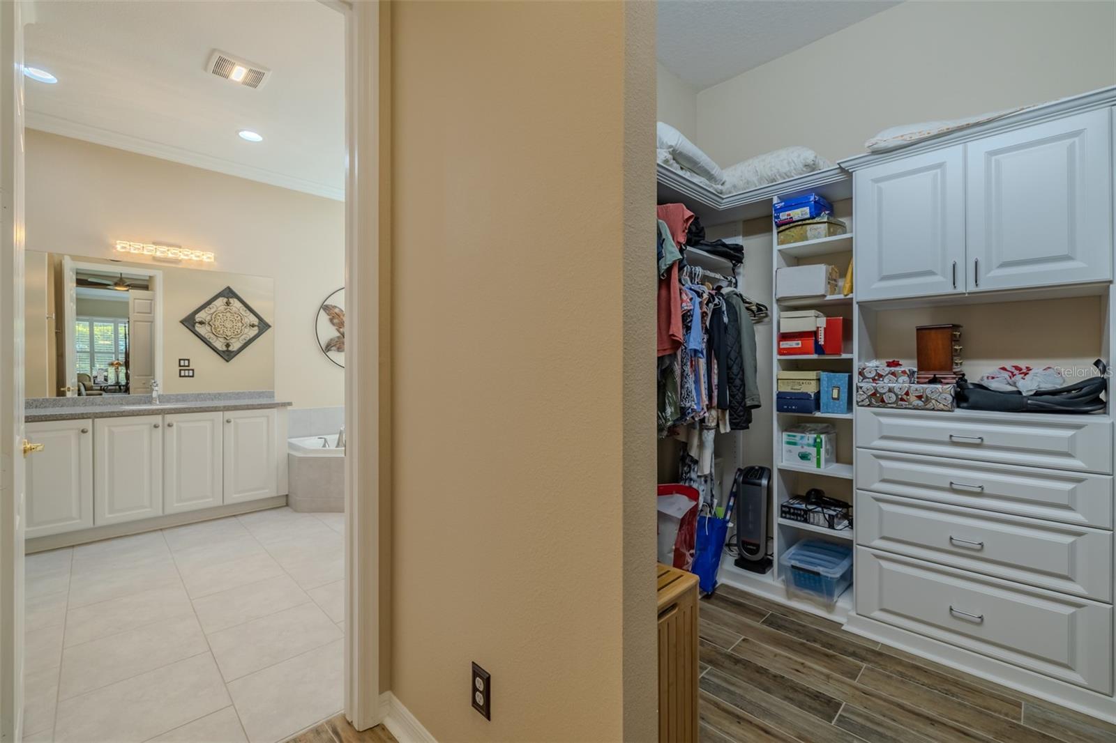Her Closet leading to Primary Ensuite