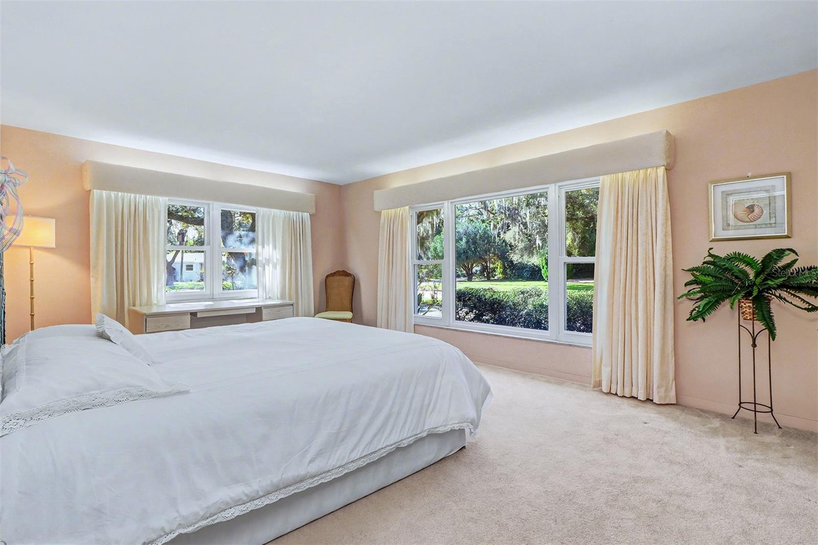 master bedroom with large windows