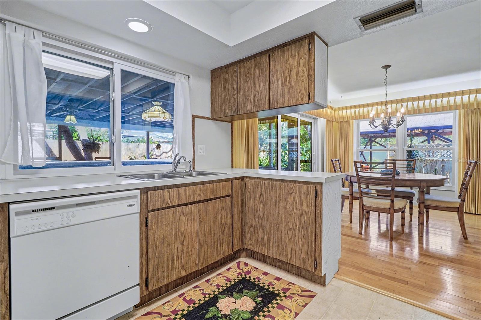 Kitchen pass thru to porch and Dining Room