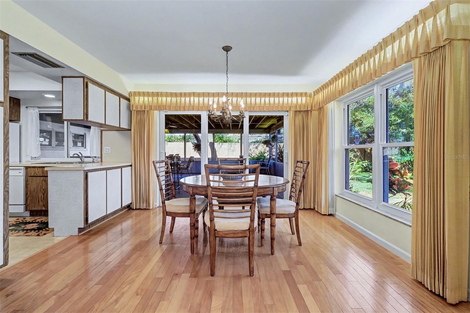Dining room with entrance to porch and Kitchen