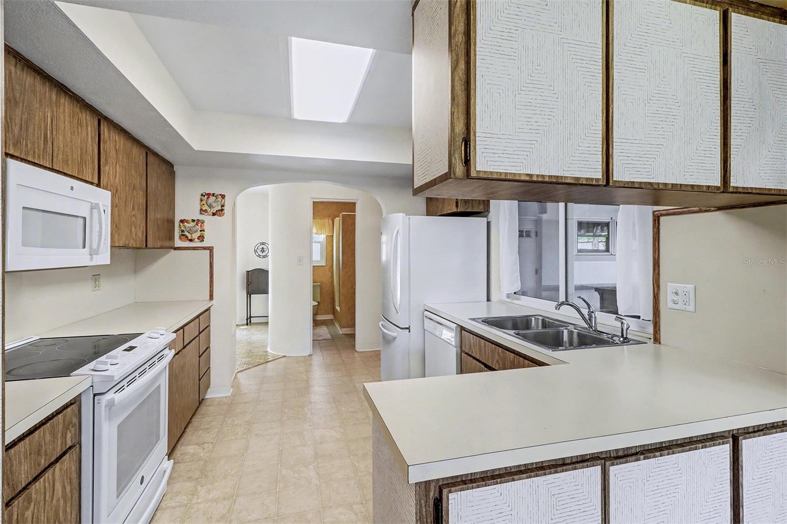 Kitchen with pass through to porch