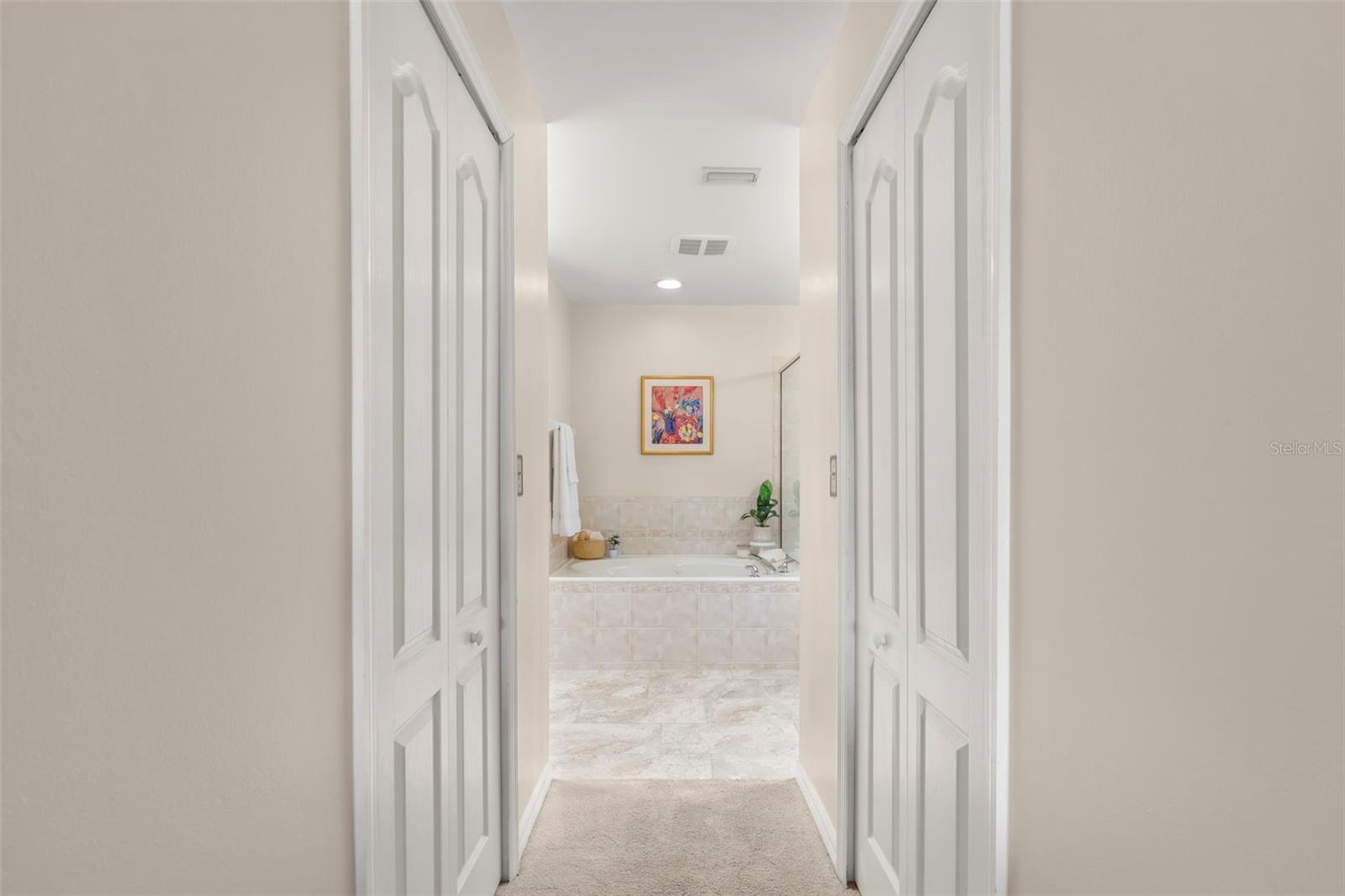 Dual Walk In Closets and En Suite