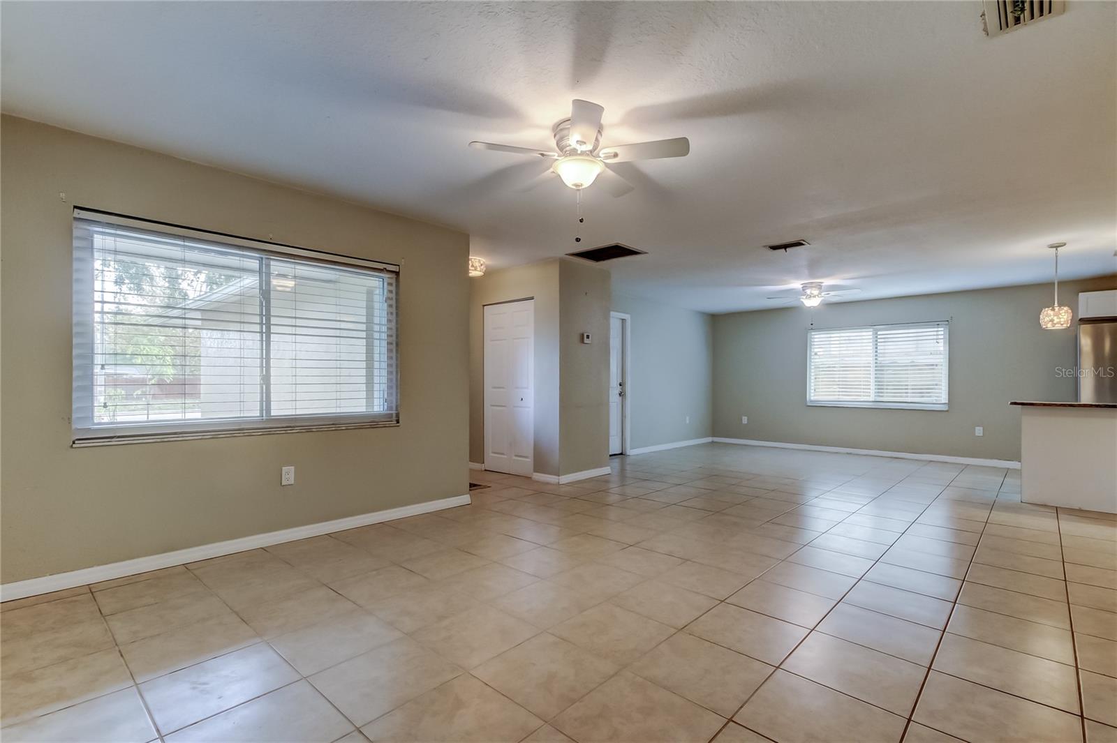 Living room looking towards family room and partial kitchen.