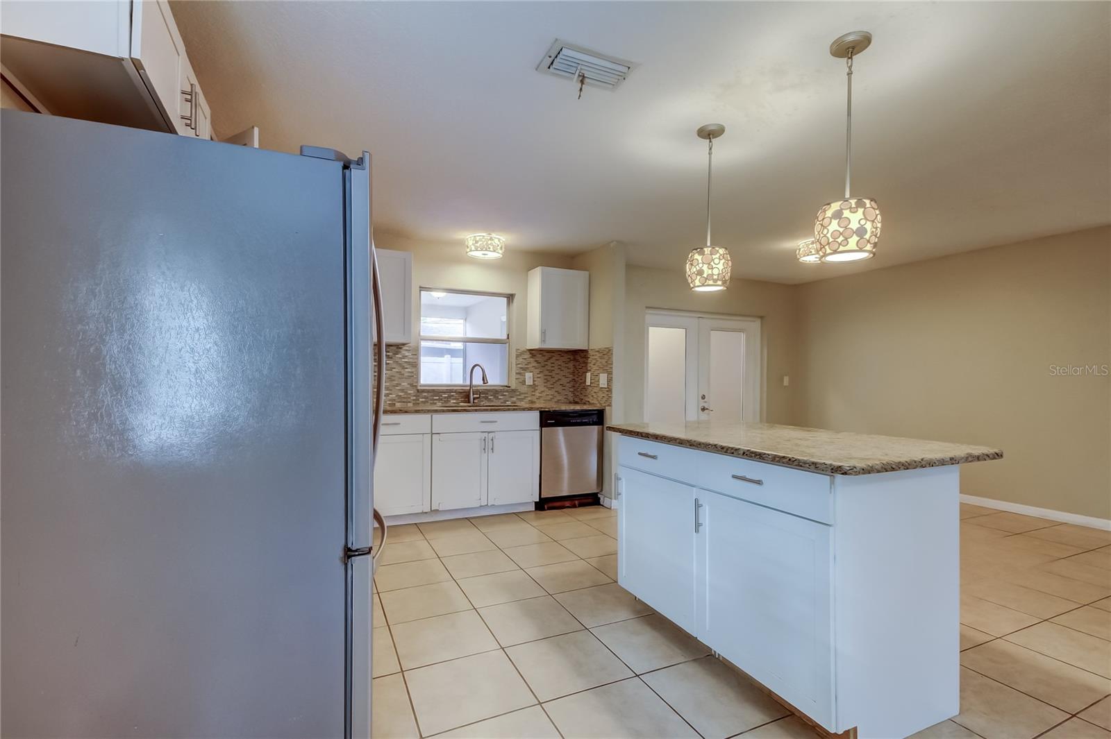 Kitchen, with island area, looking towards dining room.
