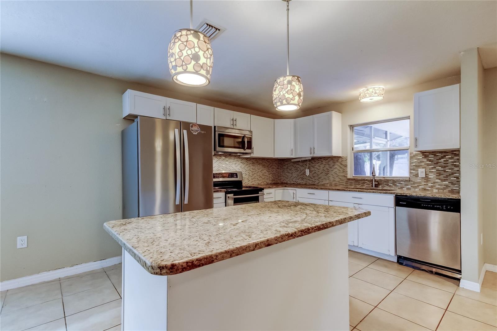 Kitchen island looking towards main kitchen area.