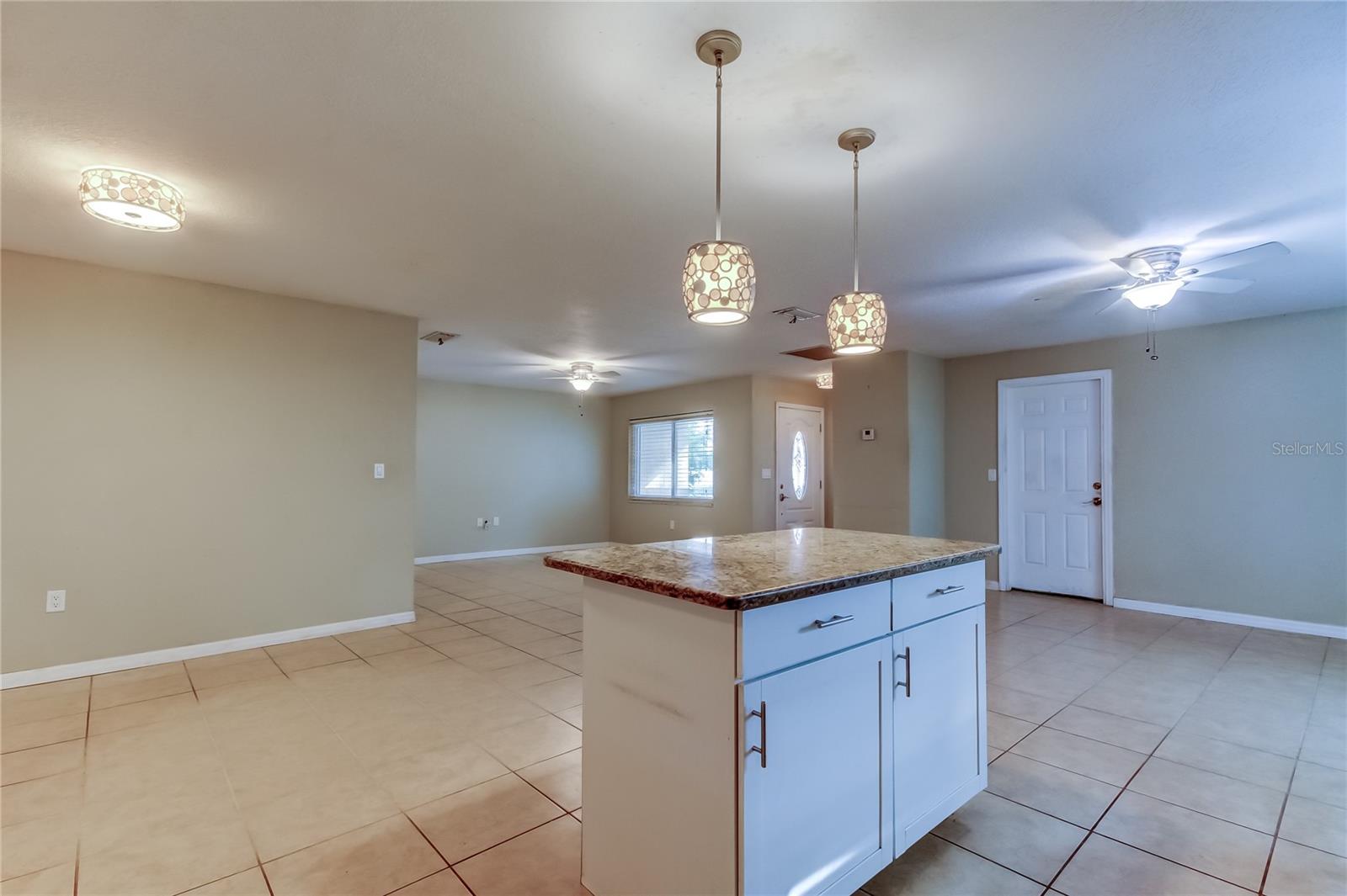 Kitchen island, looking towards, dining/family & living room.