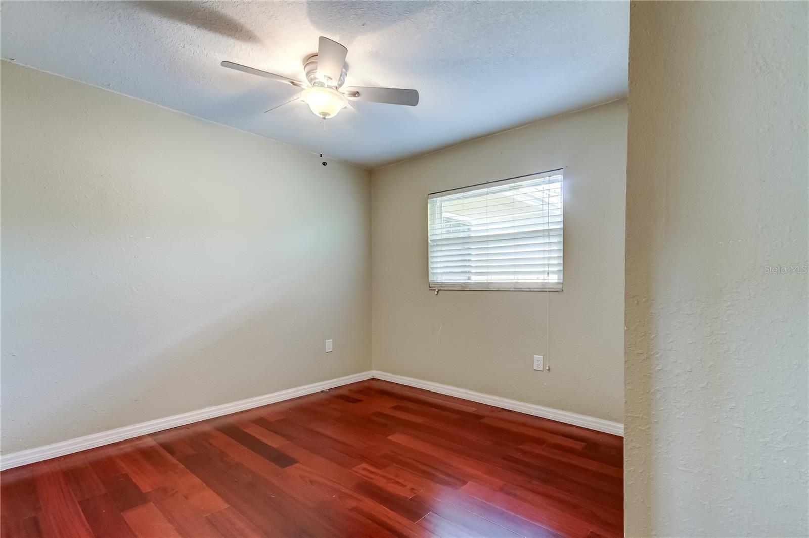 3rd bedroom with laminate flooring.