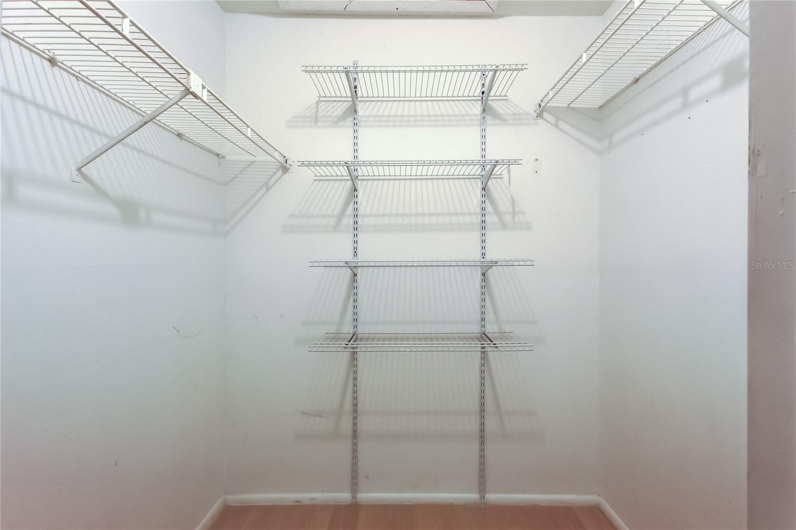 Primary walk in closet.