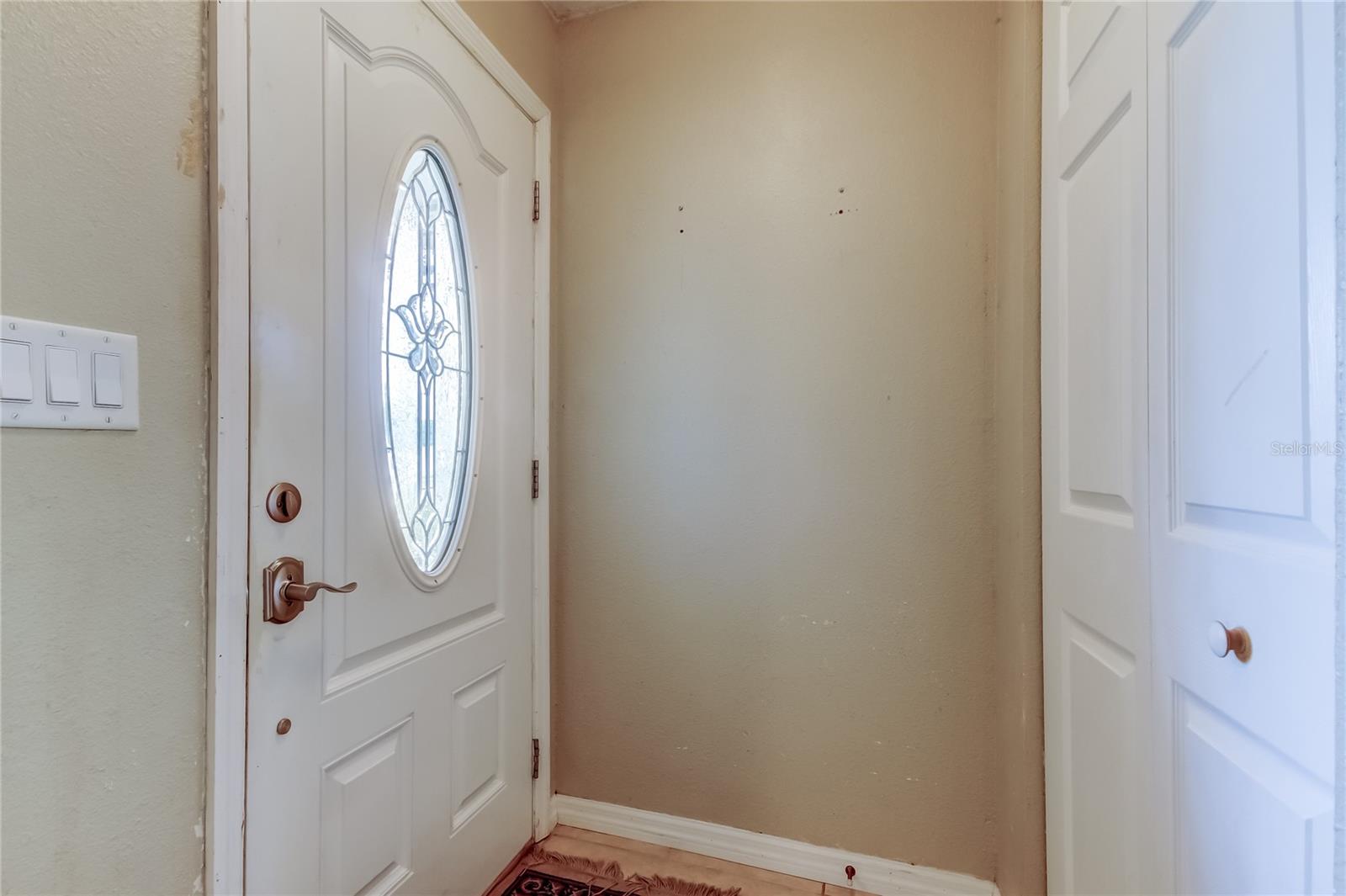 Foyer. Closet on right side.