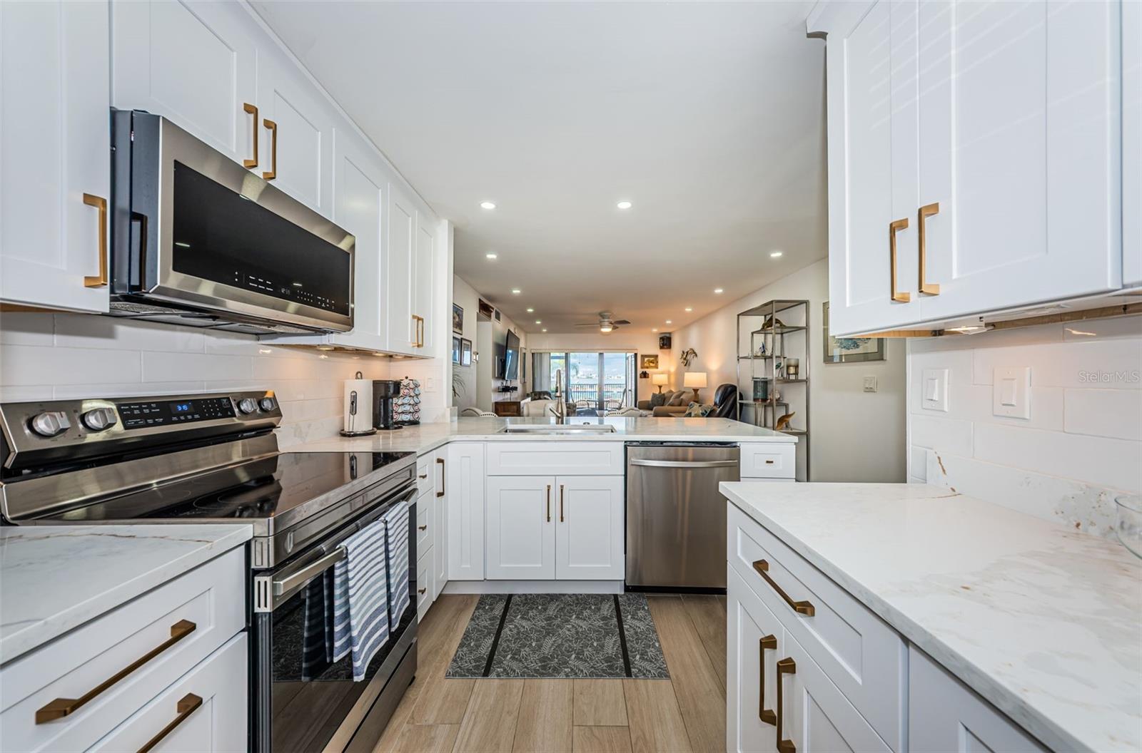 Kitchen has plenty of cabinets for lots of storage