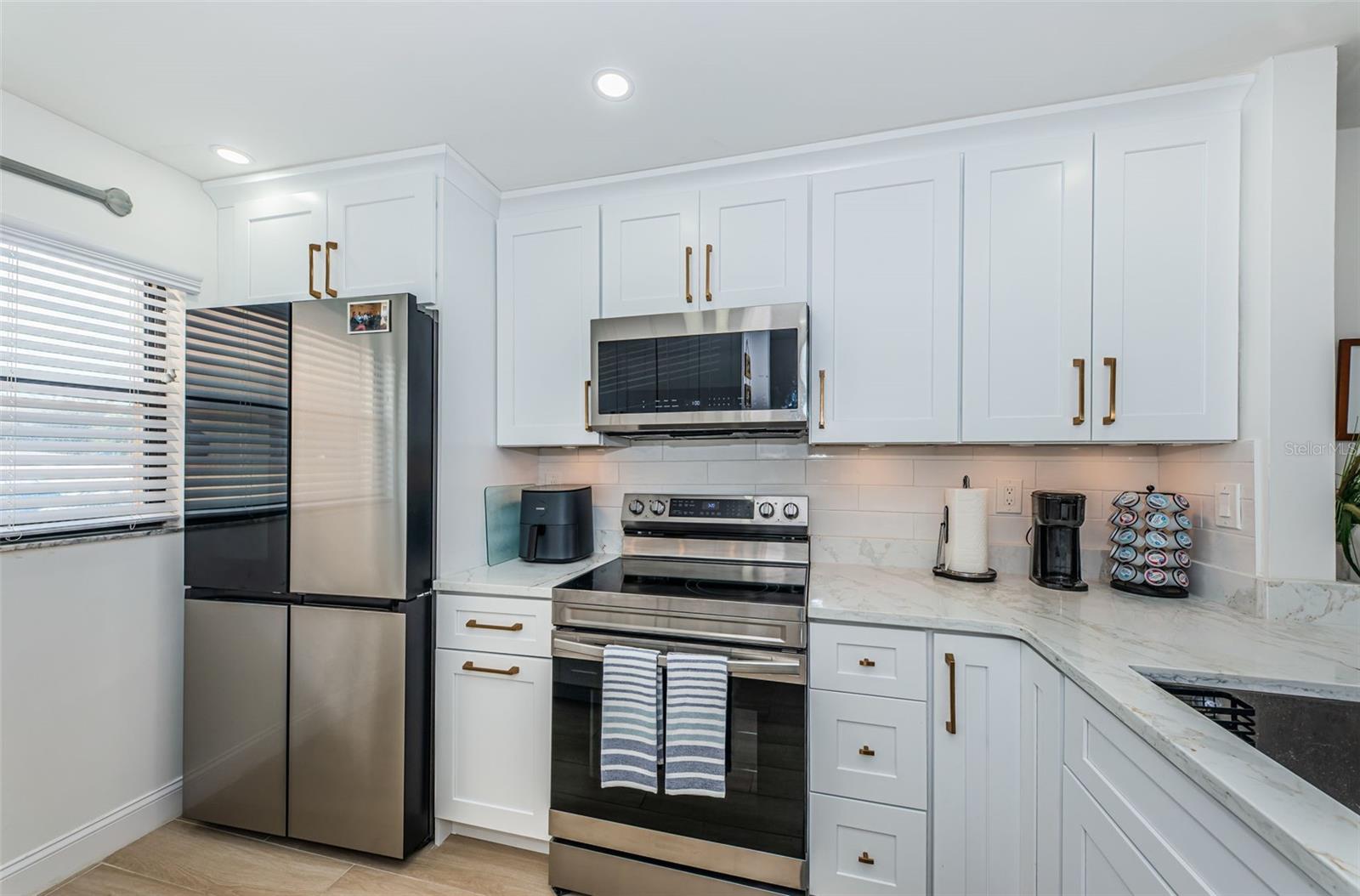 Kitchen has upscale Samsung SmartThings appliances