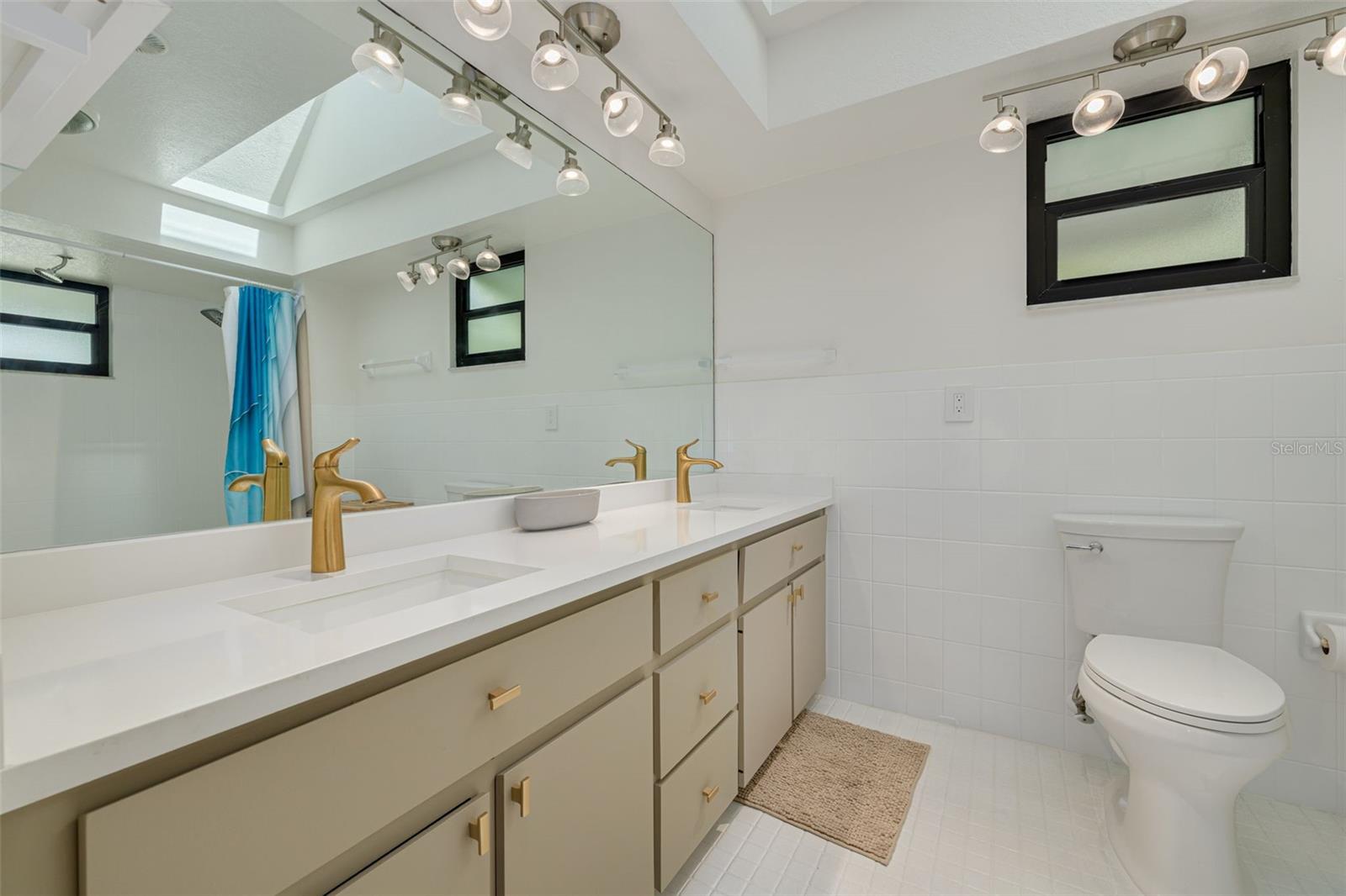 upstairs master bathroom with walk in closet