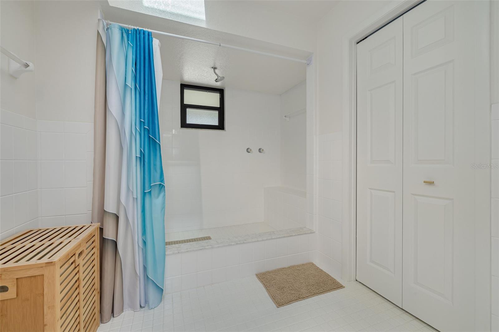 upstairs master bathroom with walk in closet