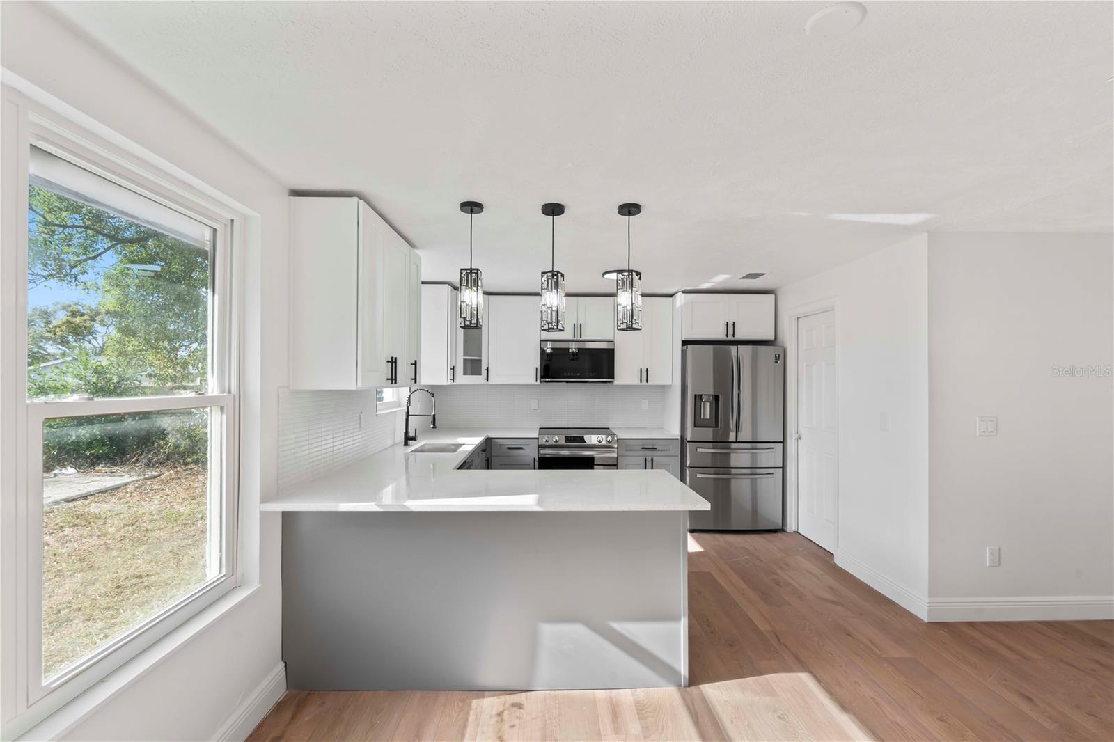 Open kitchen overlooking living area