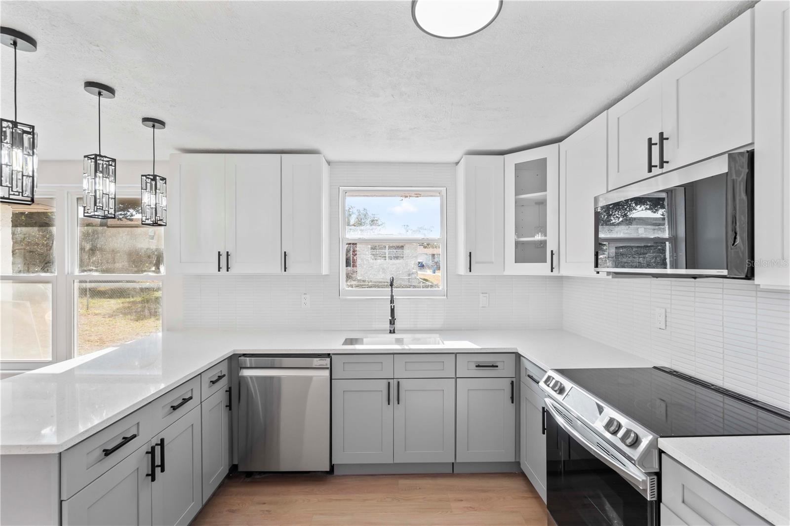 Additional kitchen angle highlighting cabinetry and workspace