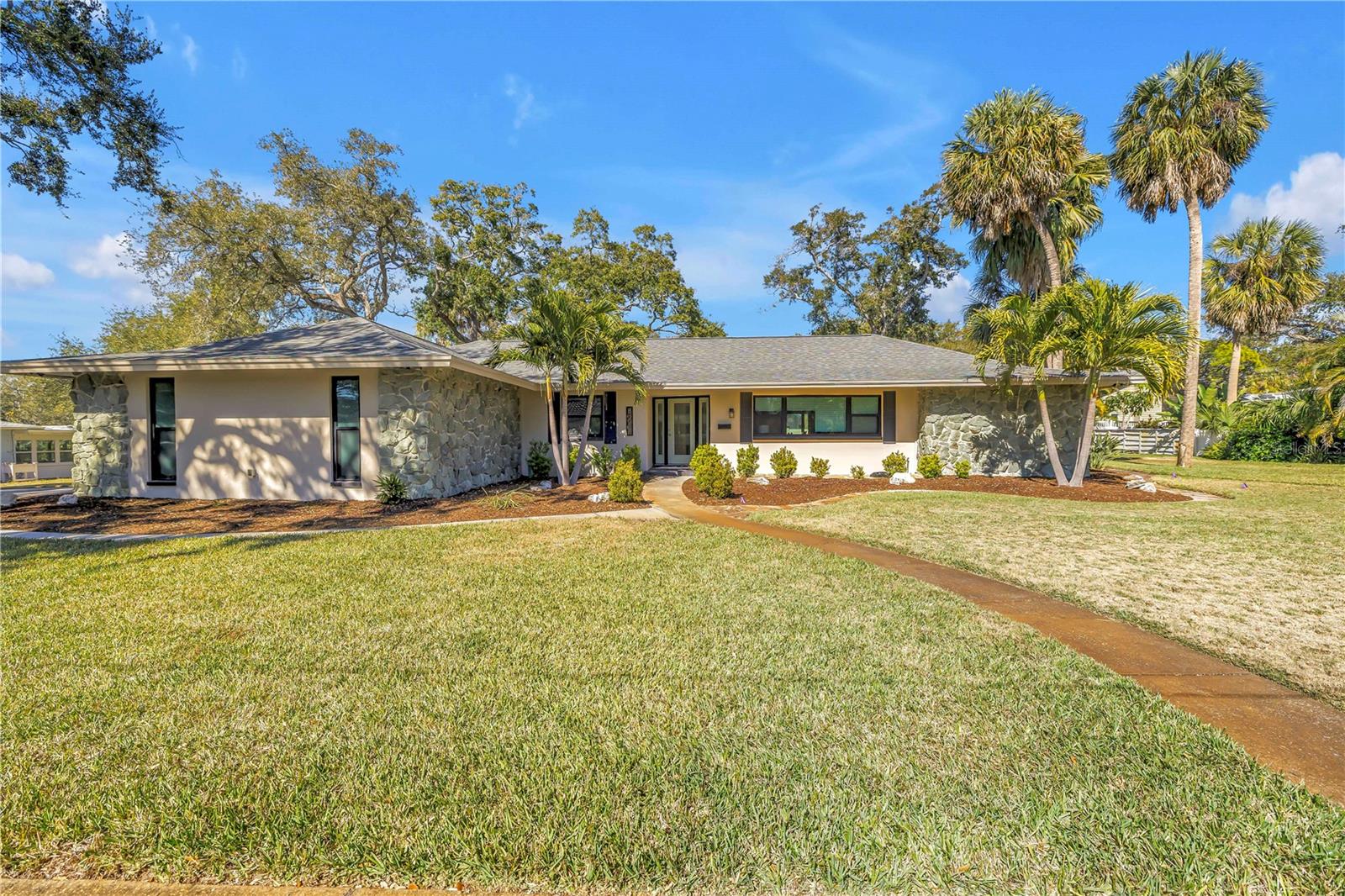 Amazing single story block home with 4 beds 3 baths an expansive yard in the front back and sides.