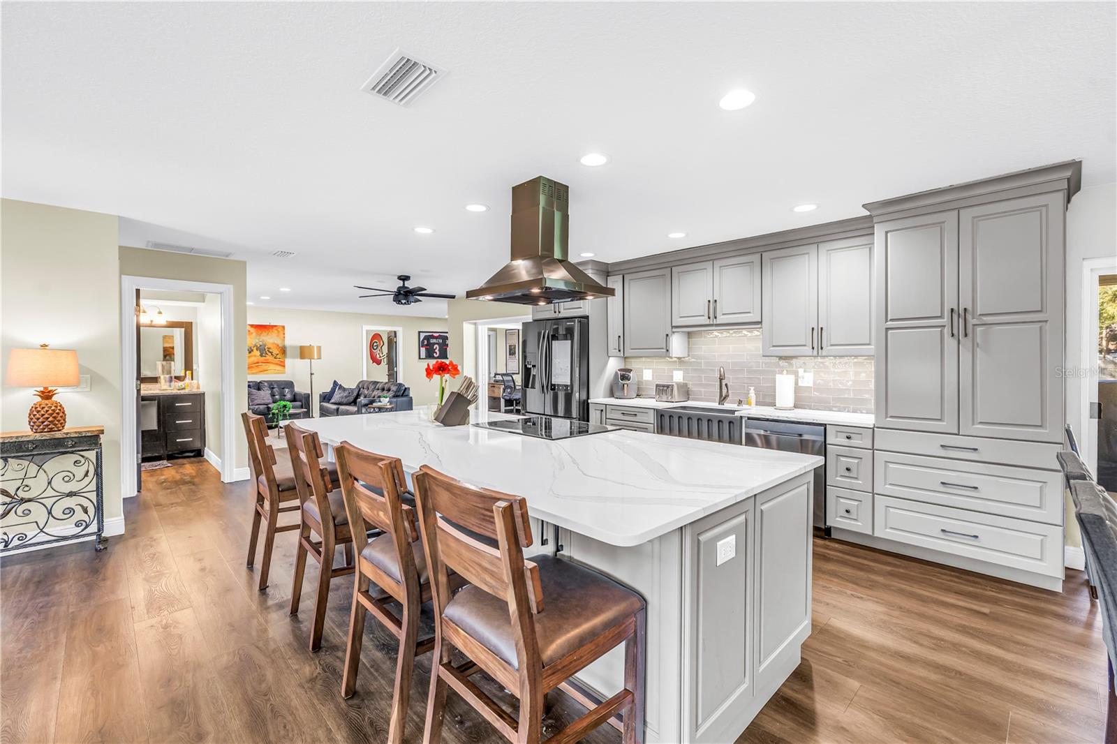 A cook's entertaining kitchen with updated top of the line stainless appliances and plenty of counter space and storage